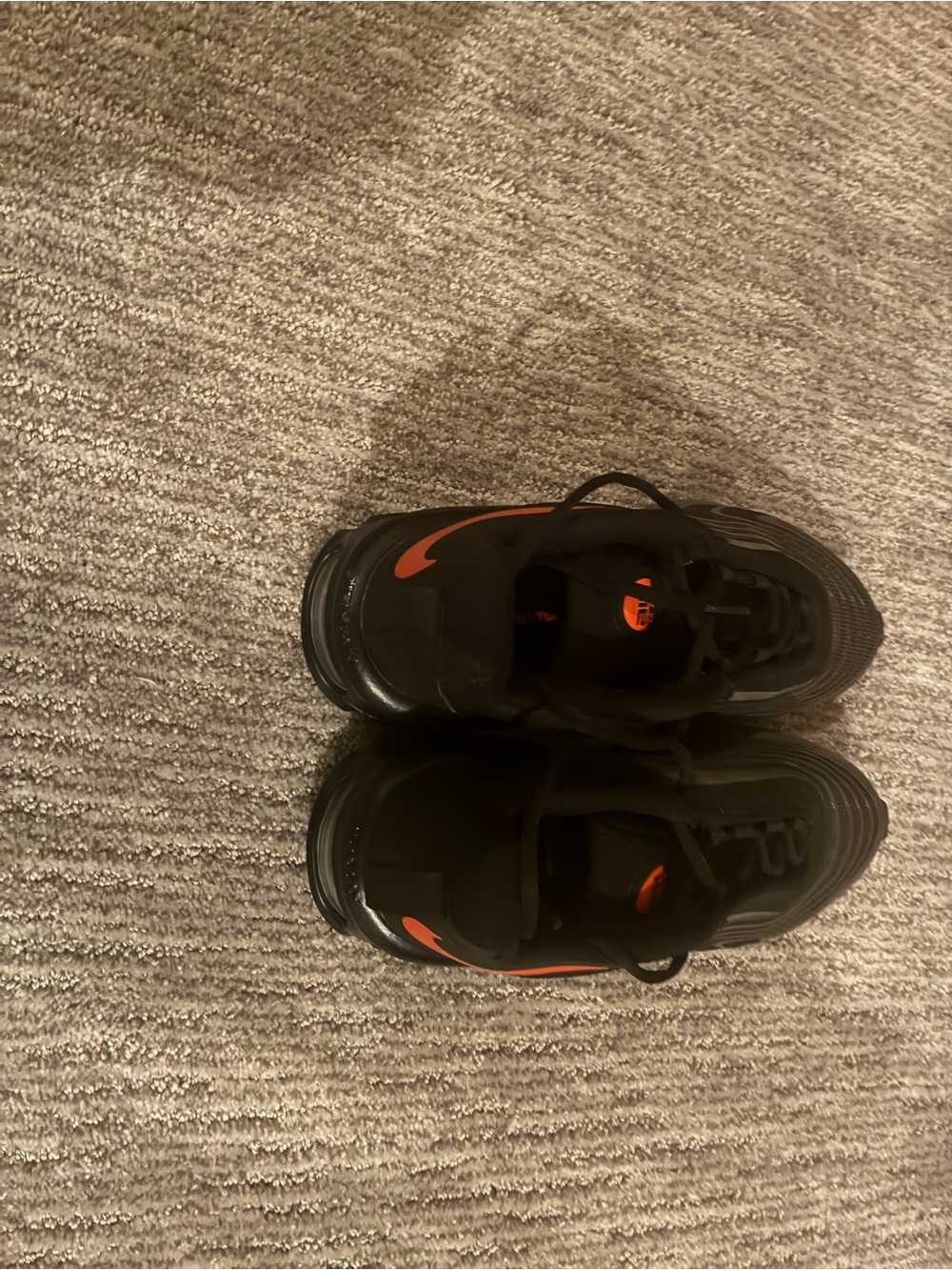 Nike Kids Black Sneakers with Orange Swoosh